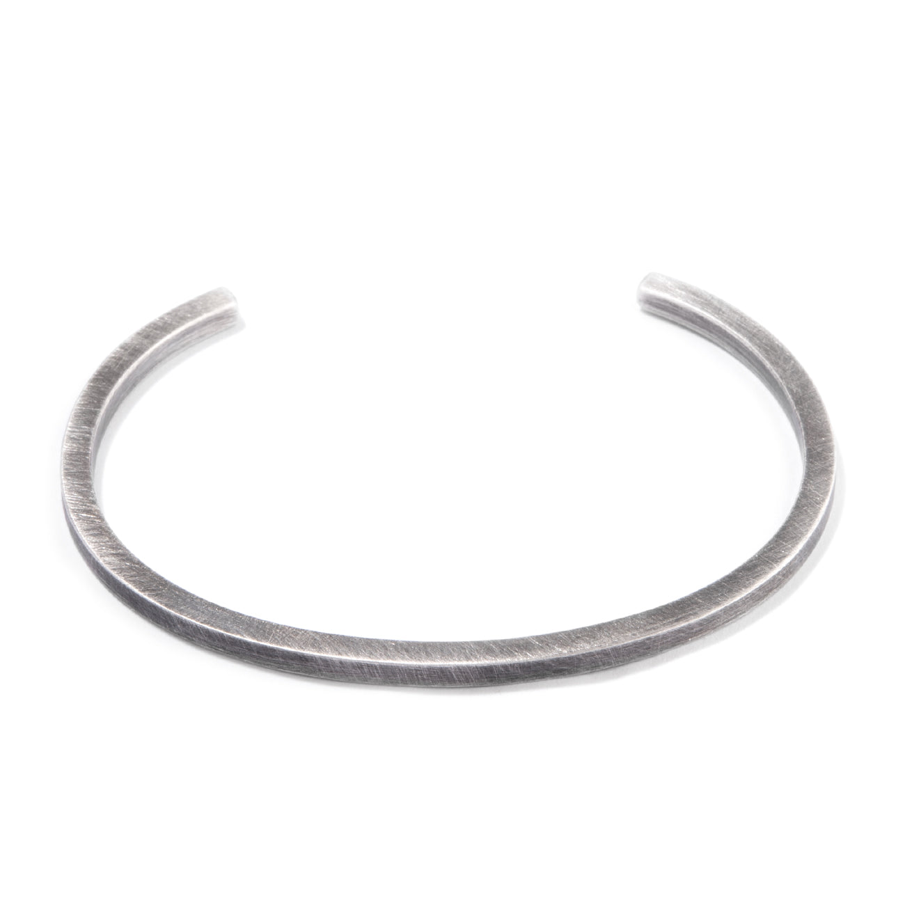 Rugged silver bangle