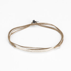 Cord bracelet with half silver bangle